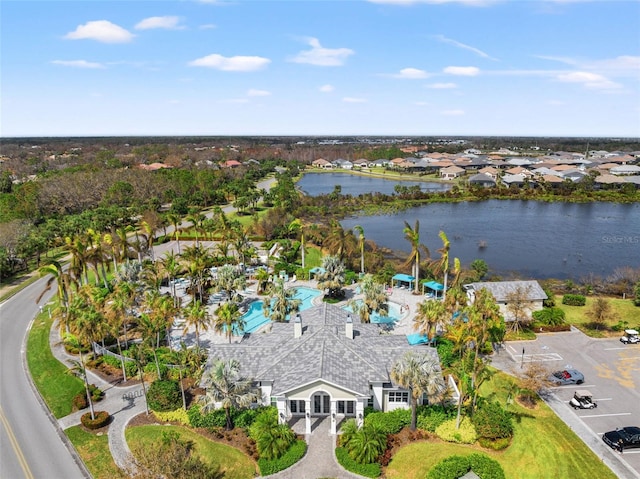 birds eye view of property featuring a water view