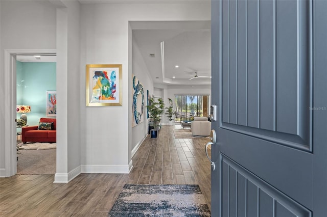 entrance foyer with ceiling fan and hardwood / wood-style floors