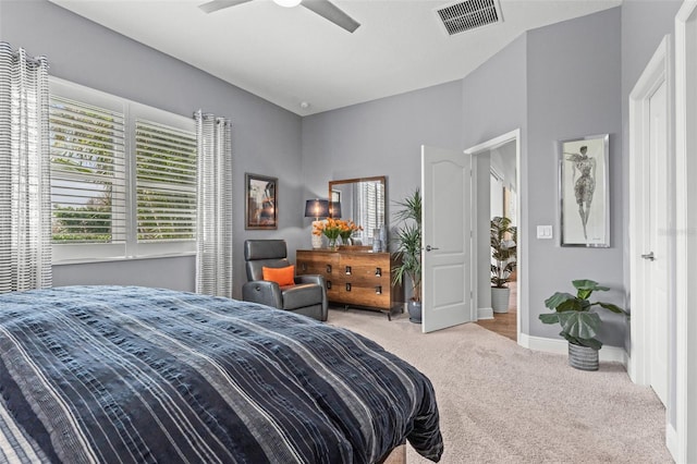 carpeted bedroom with ceiling fan