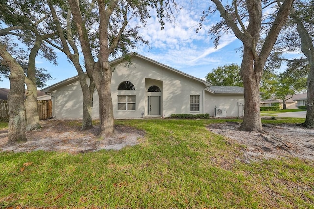 single story home with a front yard