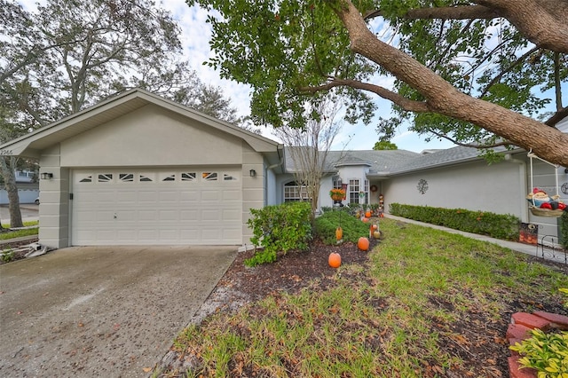 ranch-style house featuring a garage