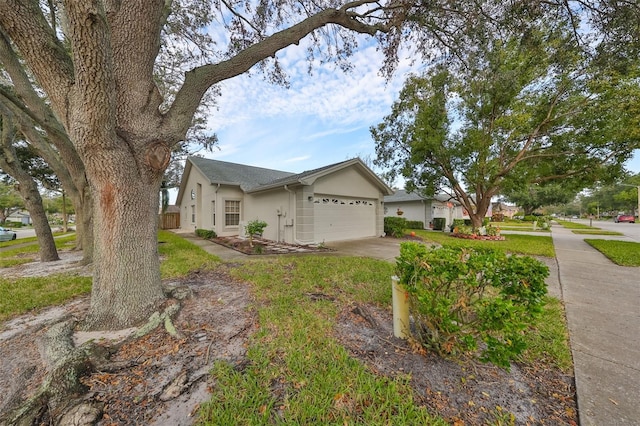 single story home with a garage