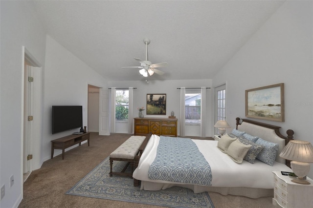 bedroom with a textured ceiling, carpet floors, ceiling fan, and lofted ceiling