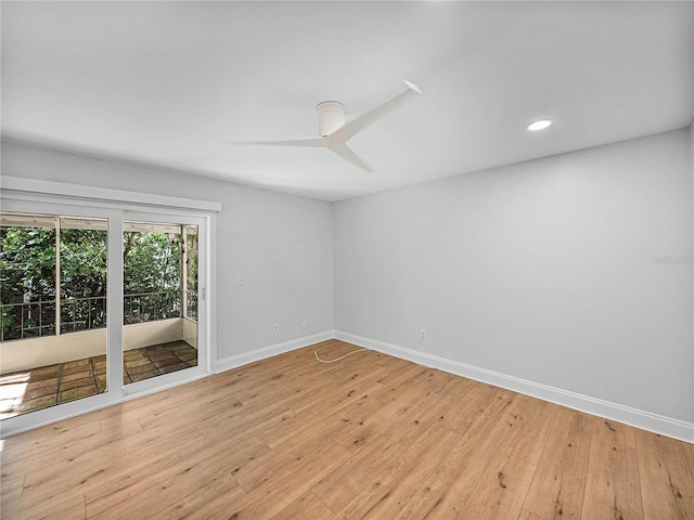 unfurnished room featuring ceiling fan and light hardwood / wood-style flooring