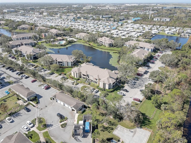 drone / aerial view with a water view