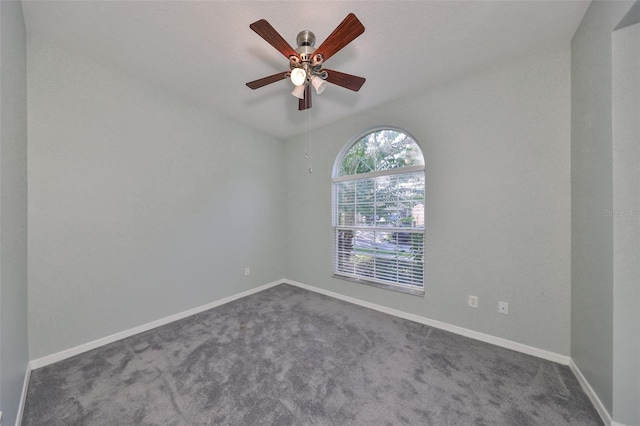 unfurnished room with lofted ceiling, carpet, and ceiling fan