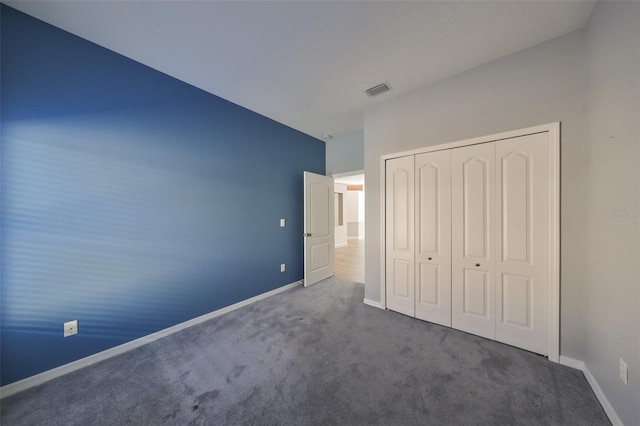 1148 Emerald Hill Way, Valrico, FL 33594 - unfurnished bedroom featuring carpet flooring, baseboards, and a closet