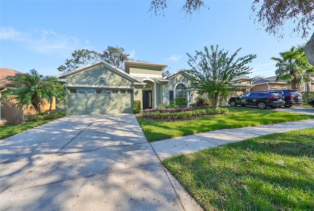 view of front of home featuring a front yard and a garage