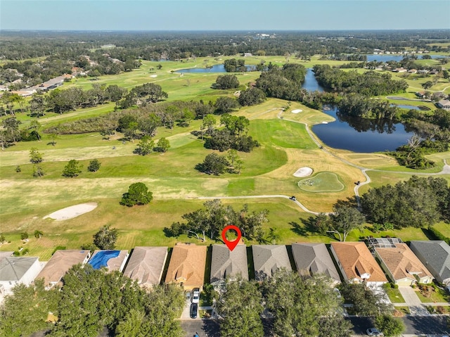 1148 Emerald Hill Way, Valrico, FL 33594 - aerial view of property and surrounding area featuring nearby suburban area, a large body of water, and a local golf course