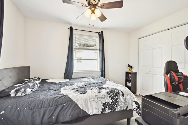 bedroom featuring a closet and ceiling fan