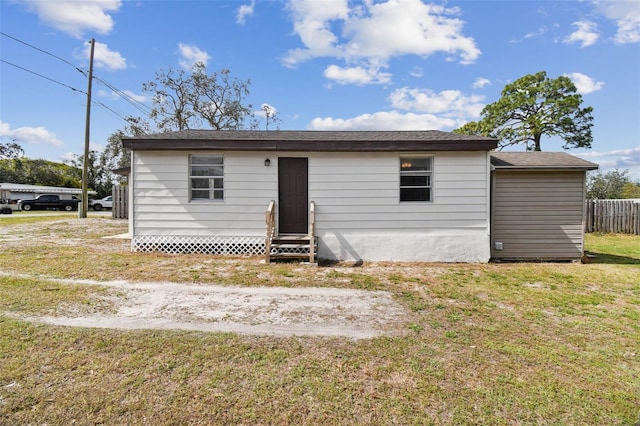 view of front of home with a front yard