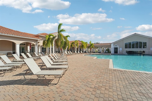 view of pool featuring a patio area