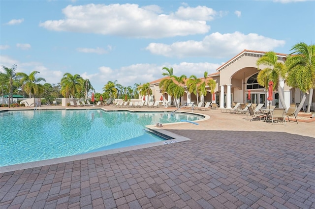 view of swimming pool featuring a patio