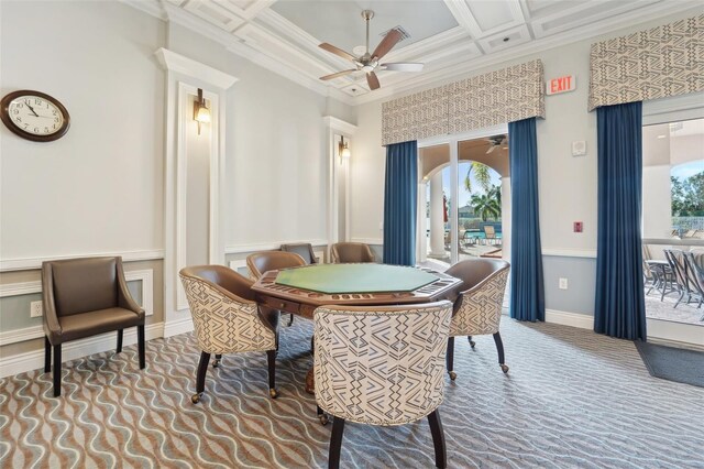 carpeted dining space with beam ceiling, coffered ceiling, crown molding, and plenty of natural light