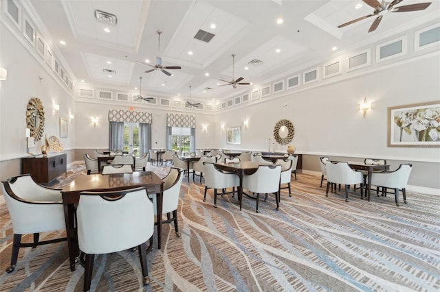 carpeted dining area featuring crown molding, coffered ceiling, beamed ceiling, and a high ceiling