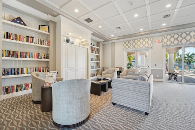 living area featuring french doors, coffered ceiling, carpet floors, ornamental molding, and built in shelves