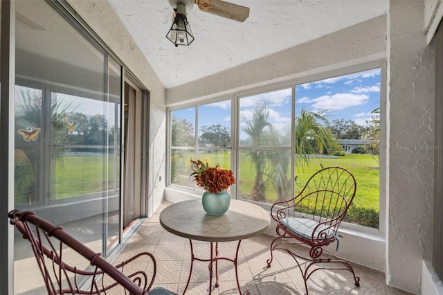 sunroom / solarium with ceiling fan