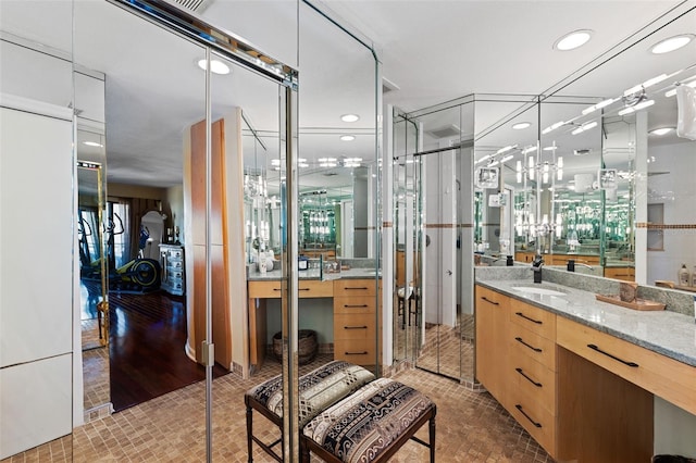 bathroom featuring hardwood / wood-style floors and vanity