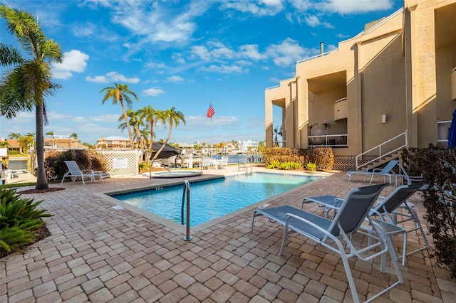 view of swimming pool featuring a patio