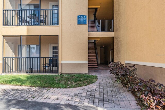 4323 Bayside Village Dr Unit 105, Tampa, FL 33615 - view of building exterior featuring stairway