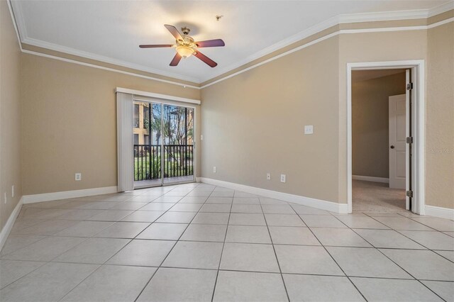 4323 Bayside Village Dr Unit 105, Tampa, FL 33615 - unfurnished room with ceiling fan, crown molding, light tile patterned floors, and baseboards
