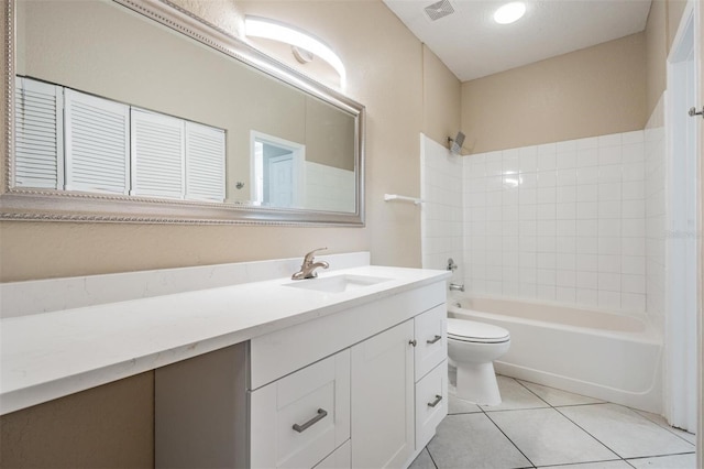 4323 Bayside Village Dr Unit 105, Tampa, FL 33615 - full bathroom with toilet,  shower combination, vanity, and tile patterned floors