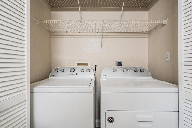 4323 Bayside Village Dr Unit 105, Tampa, FL 33615 - clothes washing area with independent washer and dryer
