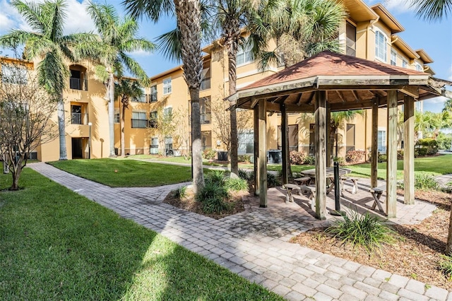 4323 Bayside Village Dr Unit 105, Tampa, FL 33615 - view of property's community featuring a gazebo and a yard