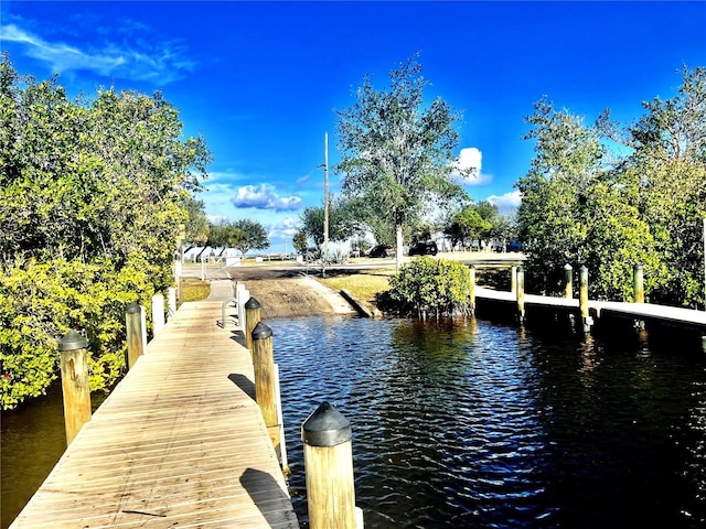 view of dock with a water view