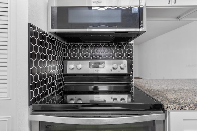 kitchen with white cabinetry and stainless steel appliances