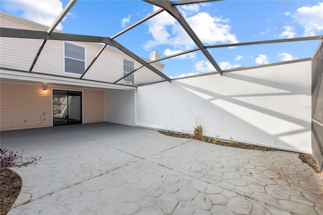 view of patio / terrace with glass enclosure