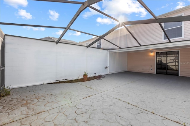 view of patio / terrace with glass enclosure