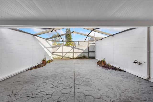 view of patio / terrace with a lanai