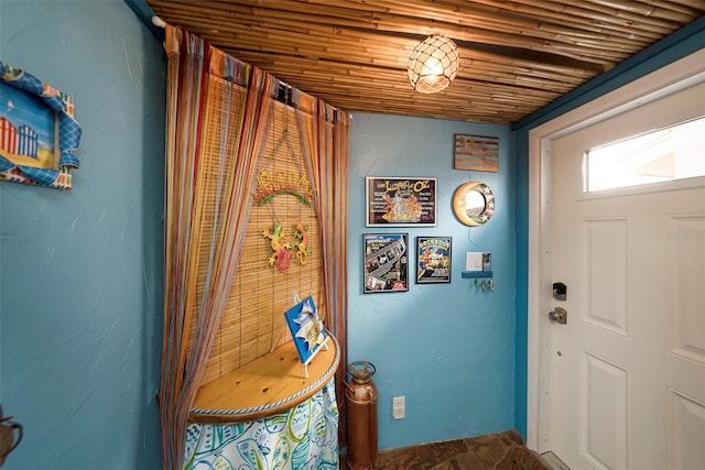 entryway with wooden ceiling