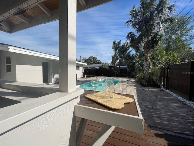 view of swimming pool with a patio area