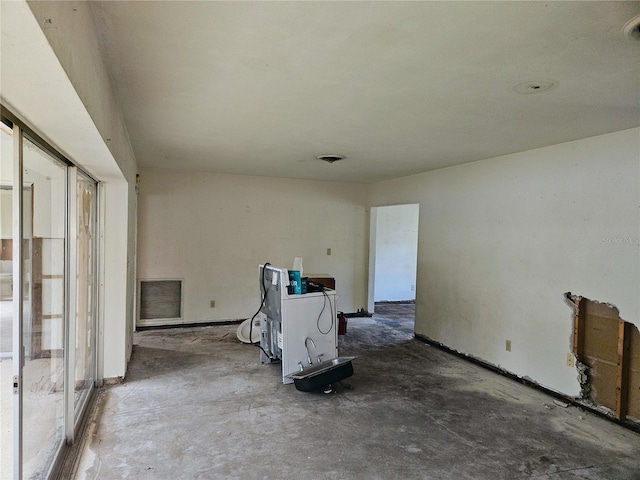 empty room featuring concrete floors