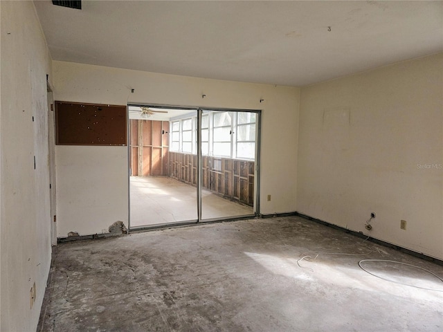 spare room featuring ceiling fan