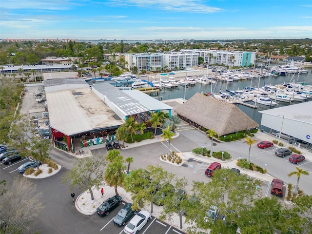 birds eye view of property with a water view