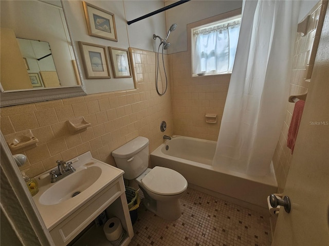 full bathroom with shower / tub combo, tile walls, toilet, vanity, and tile patterned floors