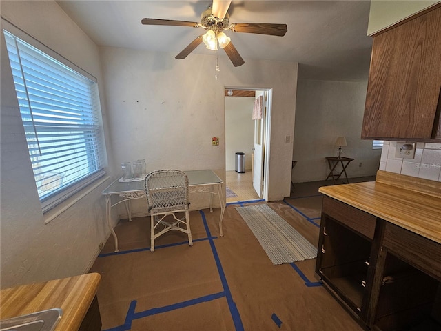 dining room with ceiling fan