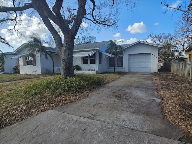 ranch-style house with a front lawn and a garage