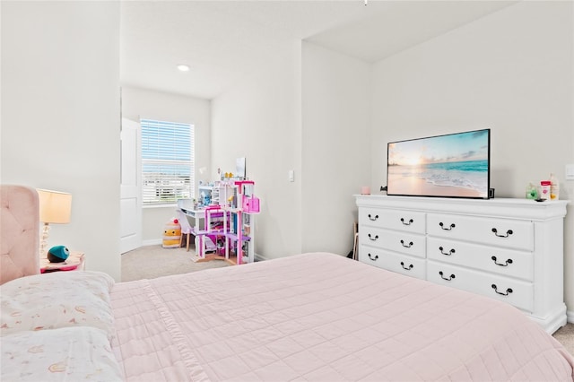 bedroom with light carpet