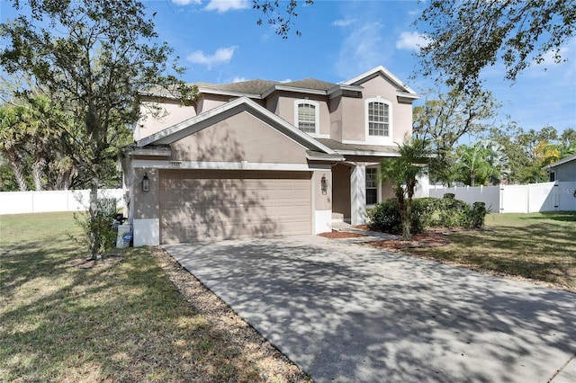 view of front of house featuring a garage and a front yard