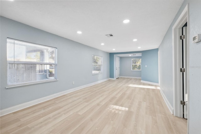 empty room with light wood-type flooring