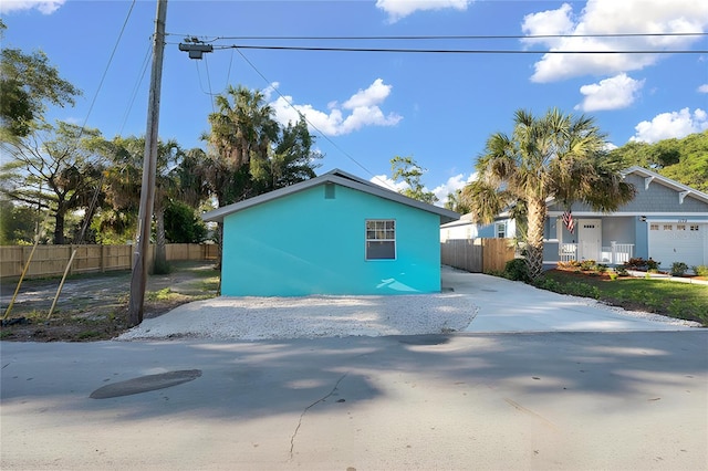 view of property exterior with a garage