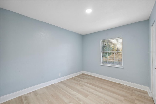 empty room with light wood-type flooring