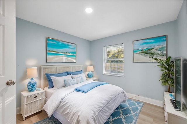 bedroom featuring light wood-type flooring