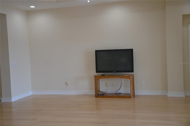 unfurnished living room with light wood-type flooring