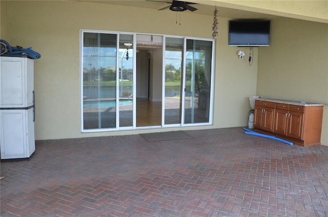 view of patio / terrace with ceiling fan