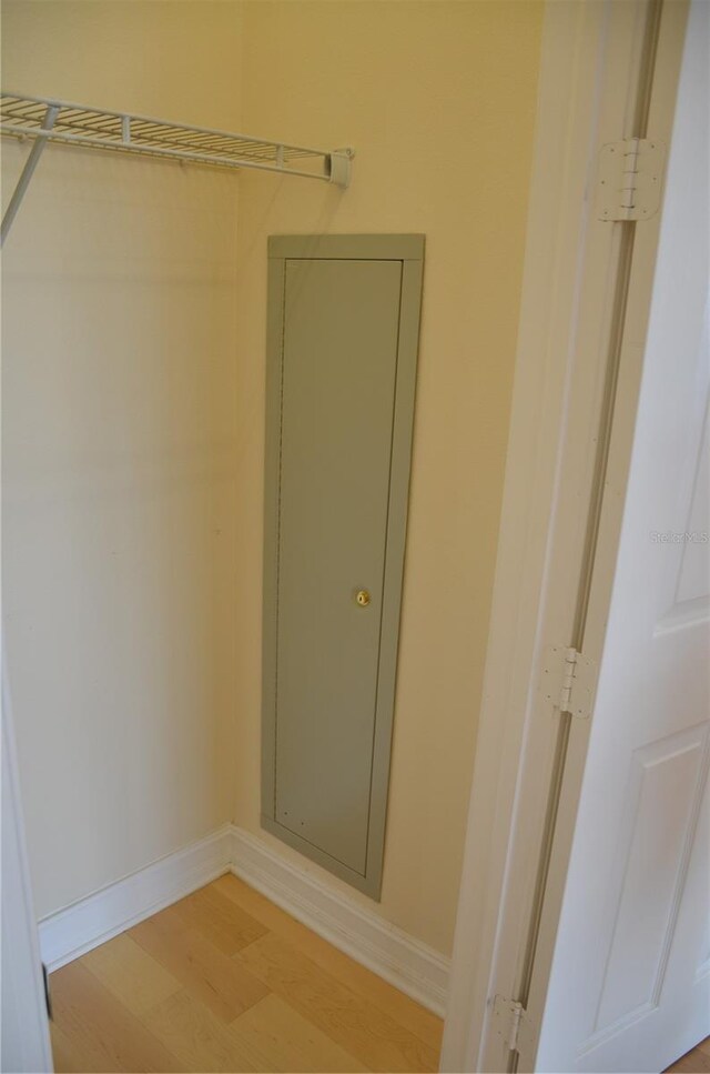 bathroom with hardwood / wood-style floors